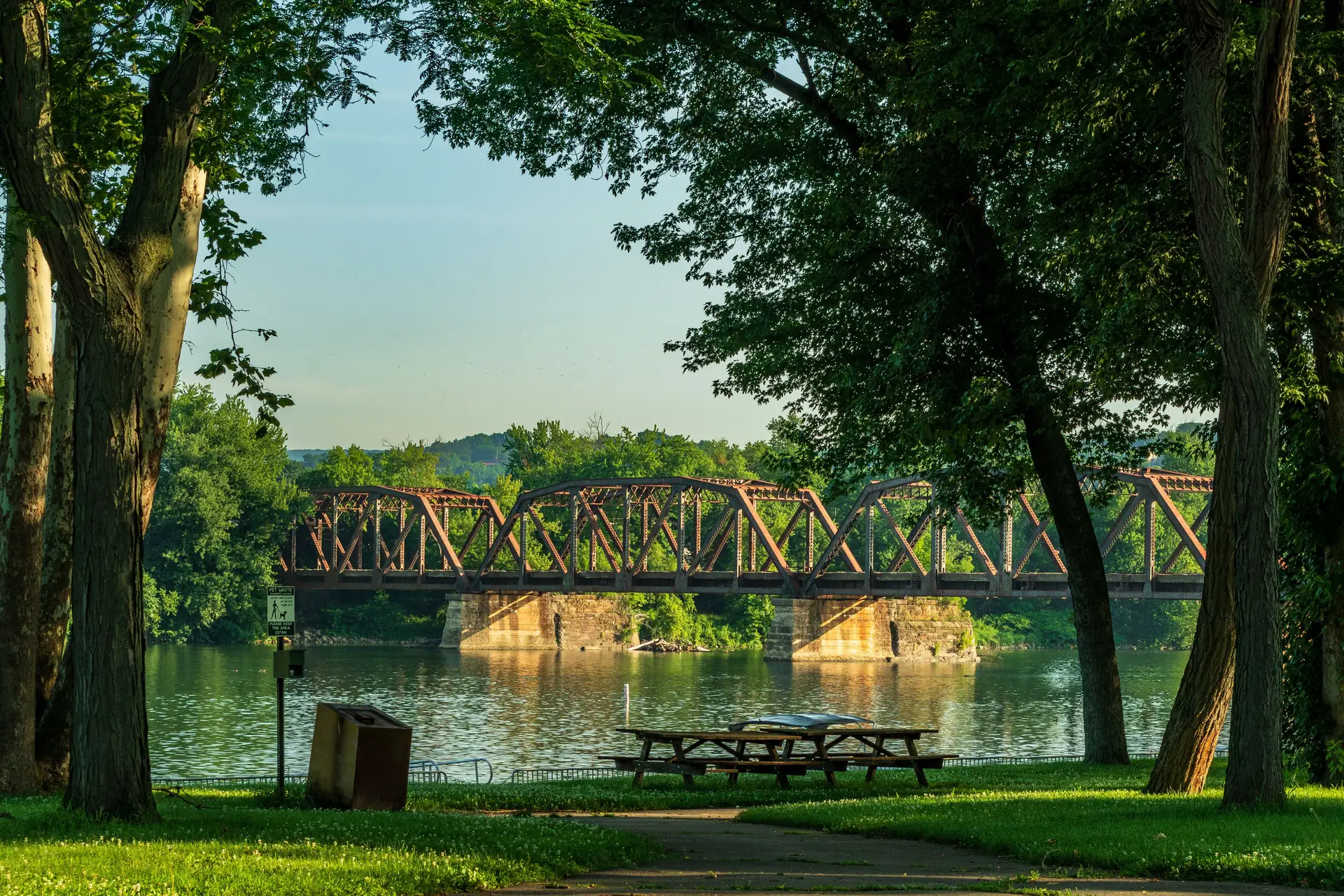 Steel railroad truss bridge over a river in Central Pennsylvania, Central PA Radon Pros