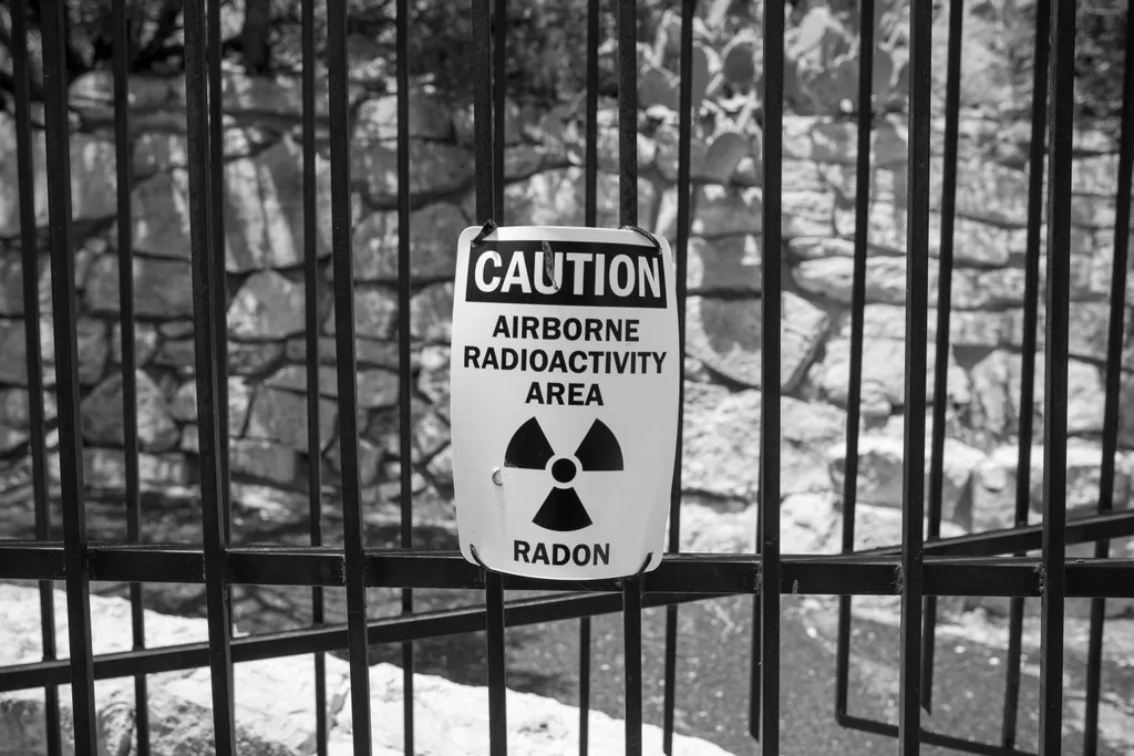 Caution sign warning of an airborne radon radioactivity area, Central PA Radon Pros